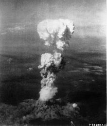 A photo taken from the Enola Gay seconds after "Little Boy" is dropped,: a mushroom cloud rises high above Hiroshima on August 6, 1945.