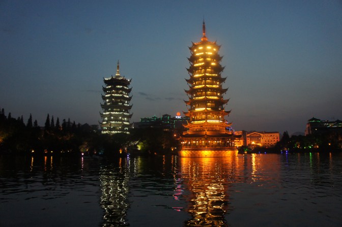 The Moon and Sun Pagodas at the edge of a lake in the middle of downtown Guilin lights up like Christmas every night for tourists and residents alike.