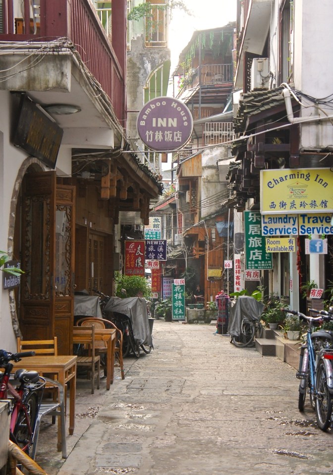 Narrow alleys in Yangshuo invite the backpackers and seasoned tourists to explore a more authentic China than some of the larger tourist centers like Beijing and Shanghai. 