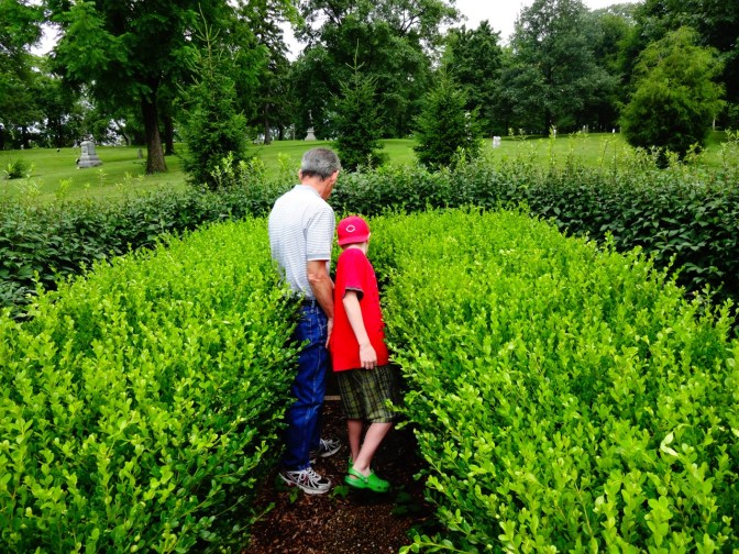 Alex's uncle John, a school teacher and life-long resident, led us on the quest to find Merrifield Vicory's final resting spot. Alex and John found the grave hidden amongst some very overgrown hedges near the High Street side of the cemetery.