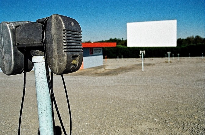 Although many drive ins have gone to using the FM radio in the car to hear the movie, some still use the ages-old mono speaker that fits on your window sill.  More than a few folks have accidentally driven off with the movie speaker still attached to their car at the end of the night.