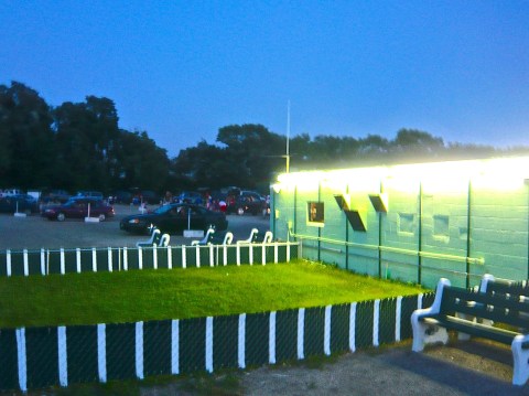Cars line up on either side of the concession stand and the booth with the giant and powerful film projectors. A playground for children and benches for those wanting a break from sitting in the car or in between shows.