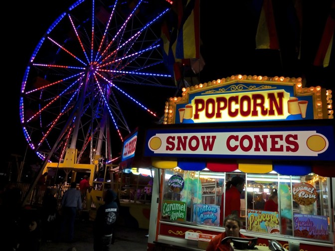 Like a summer fair midway, Sarasota lights up for the last day of the year.