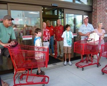 The grand opening of Charleston's firstTrader Joe's in 2011.  Alex, left filtered to the front of the line, bolted through the store to make the store's first official sale: Triple Ginger Snaps.